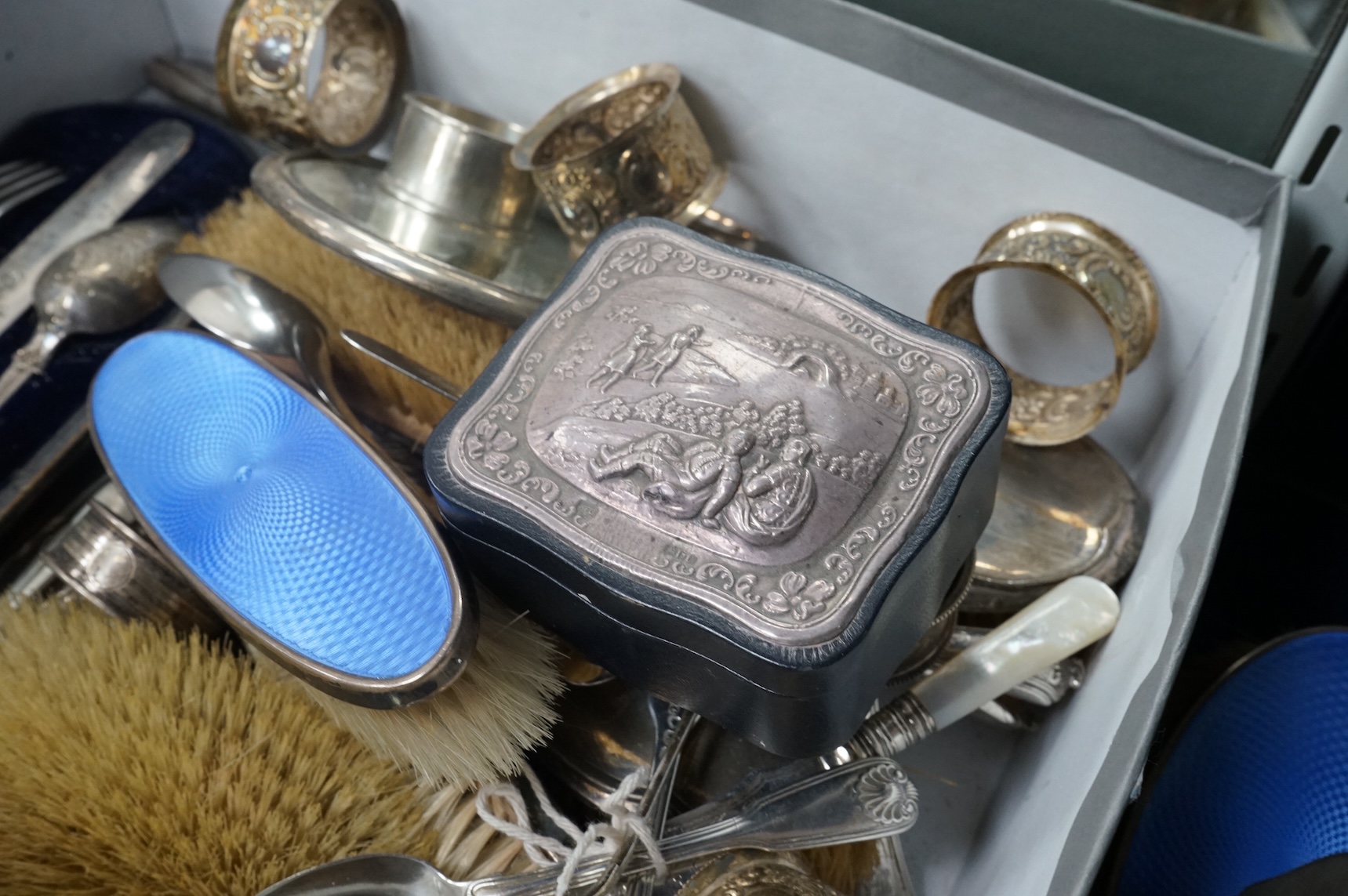 A quantity of assorted silver items including four silver and enamel clothes or hair brushes by Charles S. Green & Co Ltd, Birmingham, 1923, nine other mounted dressing table items, a Victorian christening trio, a set of